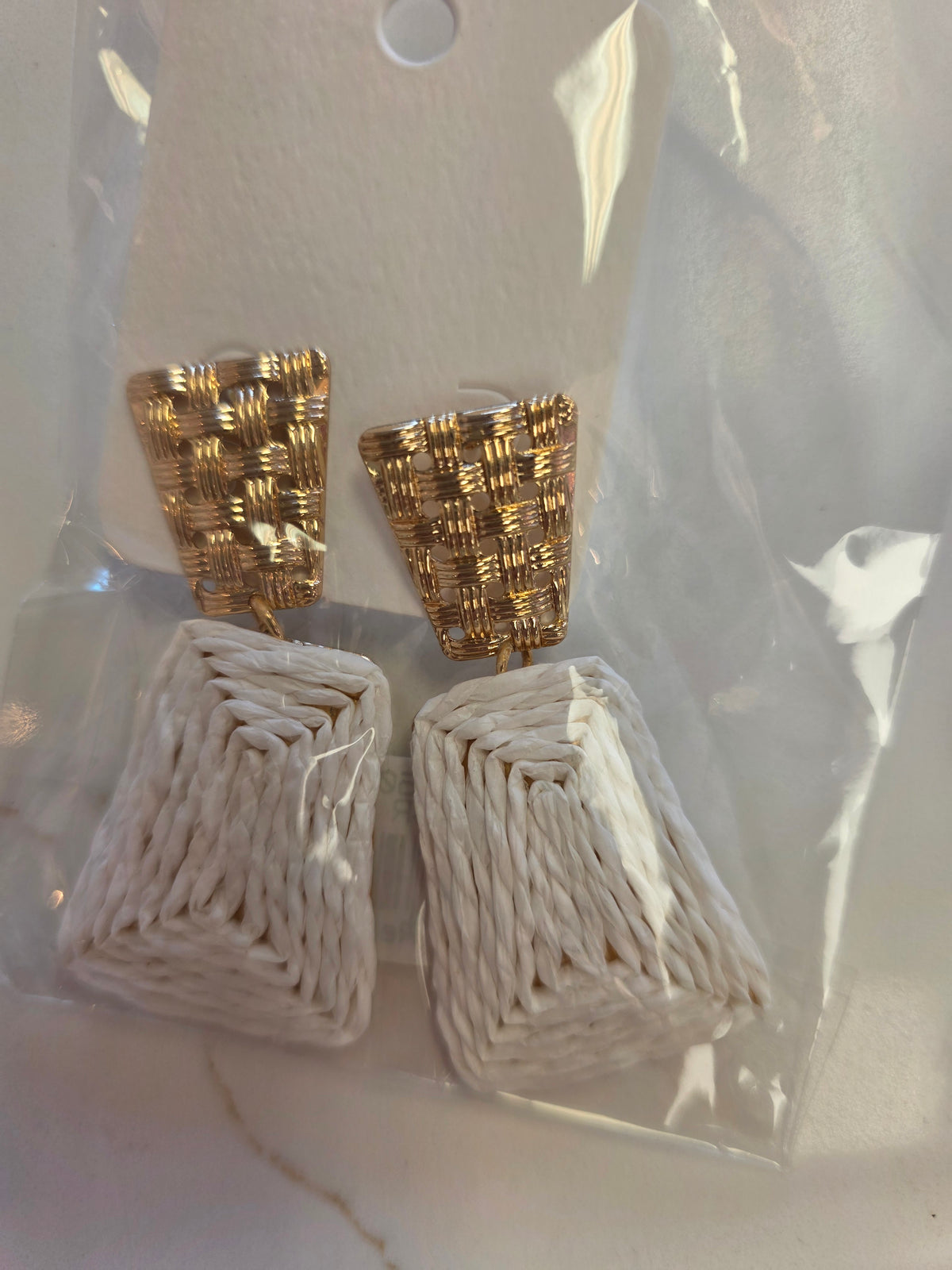 Gold and white wicker earrings